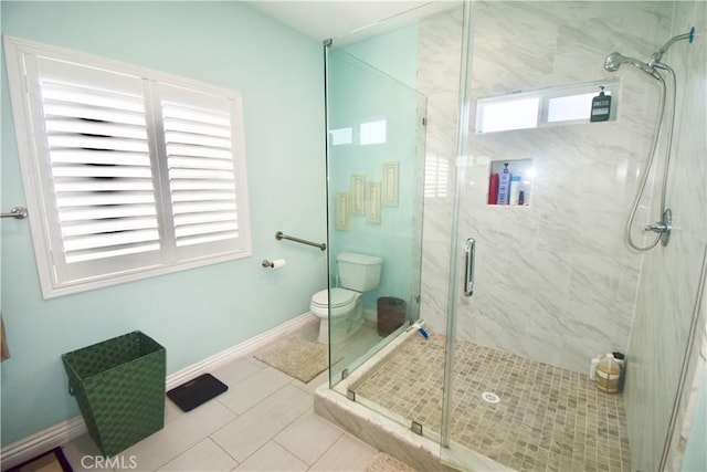 11331 Chapman Ave, Garden Grove, CA 92840 - full bathroom with a marble finish shower, toilet, tile patterned floors, and baseboards