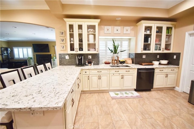 11331 Chapman Ave, Garden Grove, CA 92840 - kitchen with dishwasher, a sink, arched walkways, a peninsula, and light stone countertops