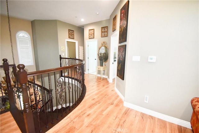11331 Chapman Ave, Garden Grove, CA 92840 - corridor featuring an upstairs landing, light wood-style floors, baseboards, and recessed lighting
