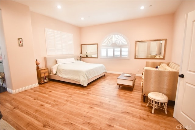 11331 Chapman Ave, Garden Grove, CA 92840 - bedroom with light wood-type flooring, recessed lighting, and baseboards