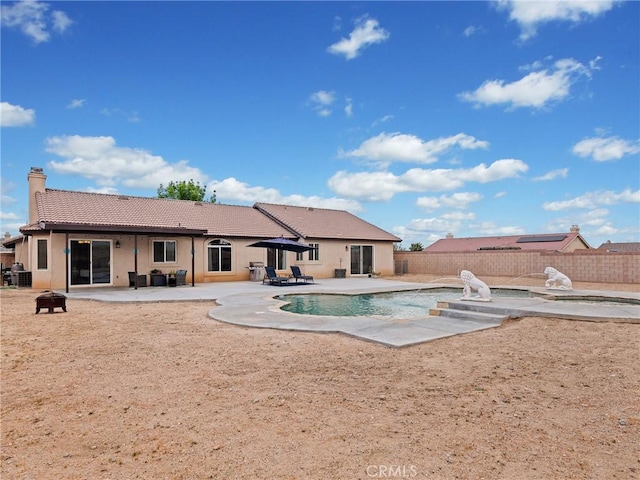 view of swimming pool with a fenced in pool, a patio, and a fenced backyard