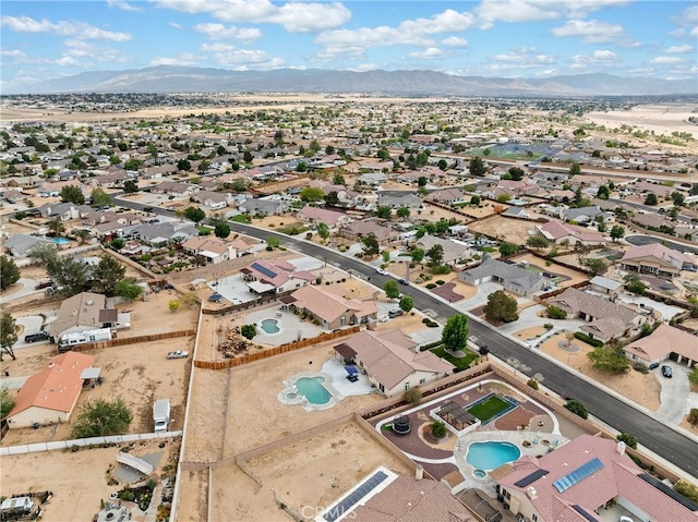 birds eye view of property featuring a residential view and a mountain view