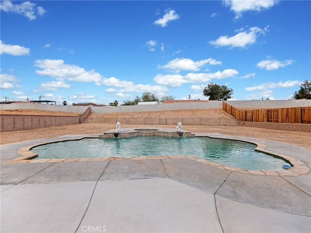 view of pool with a fenced backyard, a fenced in pool, and a patio area