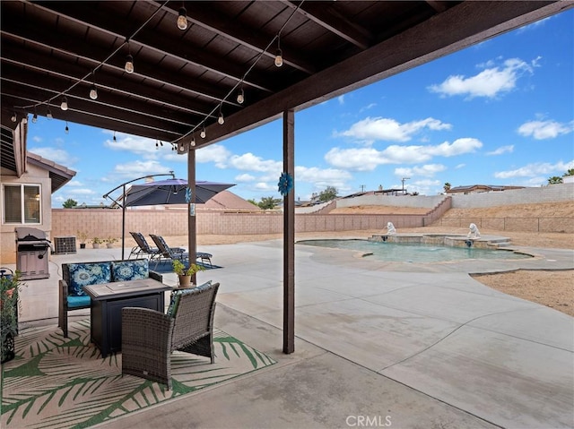 view of patio / terrace featuring a fenced backyard, a fenced in pool, and a grill