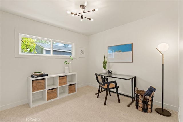 home office with an inviting chandelier, baseboards, and light carpet