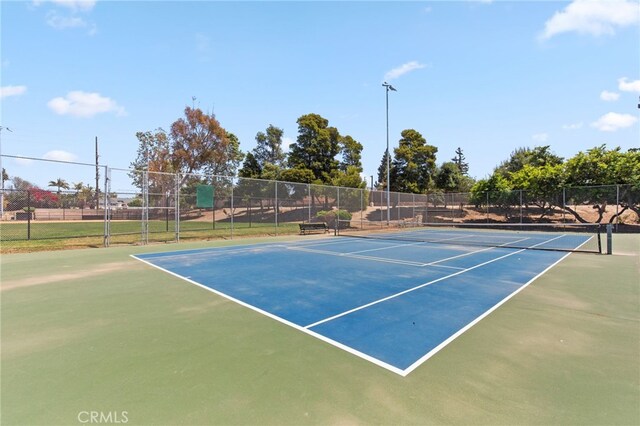 view of sport court with community basketball court and fence