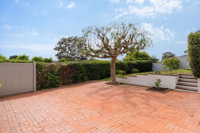 view of patio featuring a fenced backyard