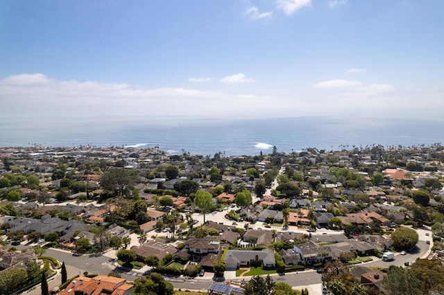birds eye view of property featuring a water view and a residential view