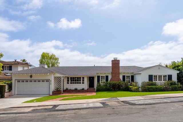 single story home with driveway, a chimney, a front lawn, an attached garage, and stucco siding