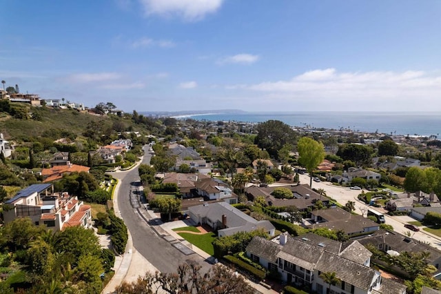 bird's eye view featuring a water view and a residential view