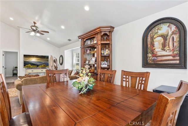 dining area with ceiling fan, recessed lighting, and lofted ceiling