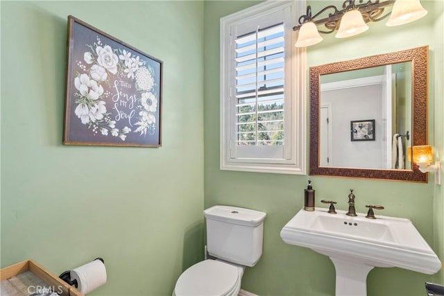 bathroom with a sink and toilet