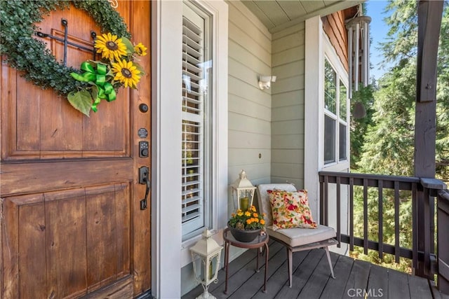 doorway to property with a porch