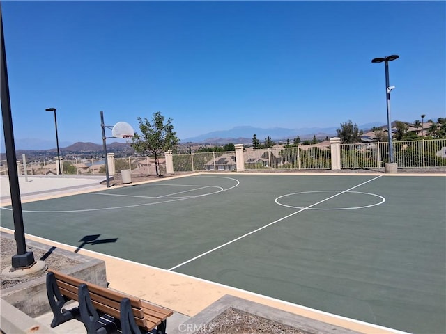 33 Corte Rivera, Lake Elsinore, CA 92532 - view of basketball court featuring community basketball court and a mountain view