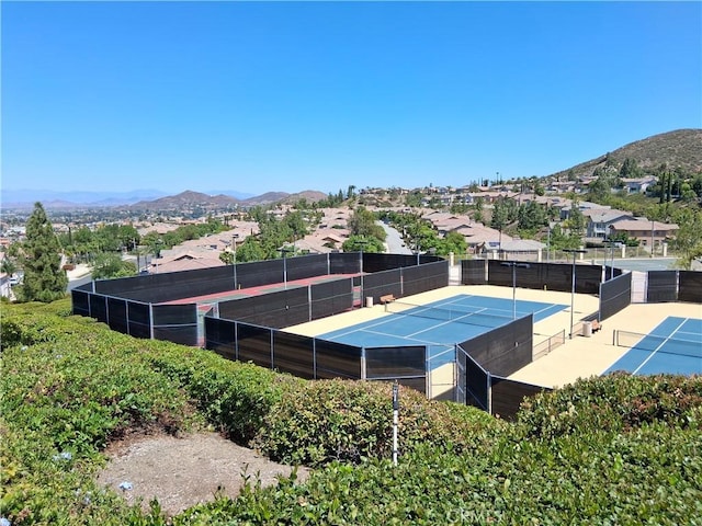 33 Corte Rivera, Lake Elsinore, CA 92532 - view of tennis court with a mountain view