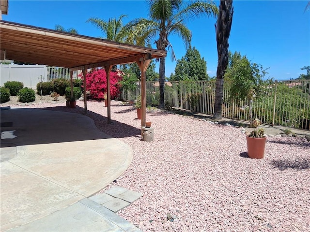 33 Corte Rivera, Lake Elsinore, CA 92532 - fenced backyard featuring a patio