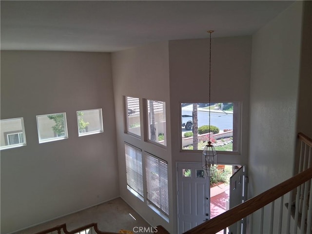 33 Corte Rivera, Lake Elsinore, CA 92532 - detailed view of carpet floors and a chandelier