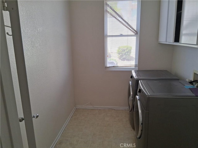 33 Corte Rivera, Lake Elsinore, CA 92532 - laundry room featuring independent washer and dryer, baseboards, and cabinet space