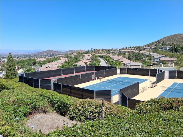 33 Corte Rivera, Lake Elsinore, CA 92532 - view of tennis court featuring a mountain view