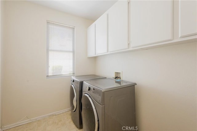 33 Corte Rivera, Lake Elsinore, CA 92532 - laundry room featuring washing machine and dryer and cabinet space