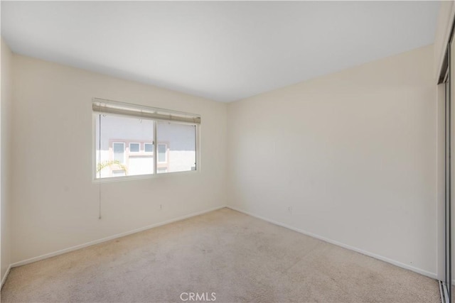 33 Corte Rivera, Lake Elsinore, CA 92532 - carpeted spare room with baseboards
