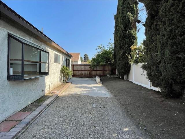 835 Plumwood St, Colton, CA 92324 - view of yard with a fenced backyard and a patio