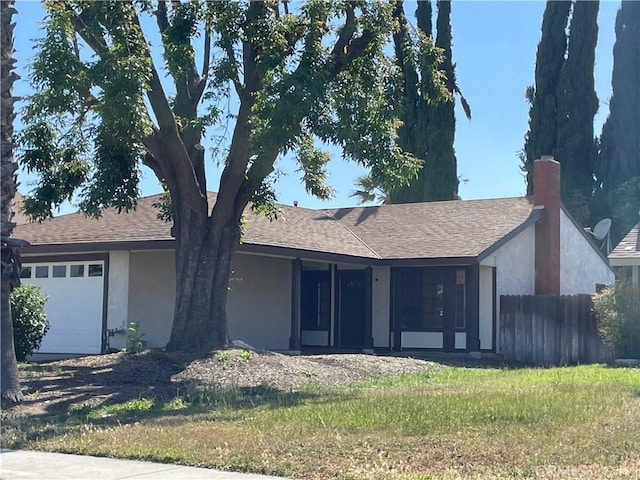 835 Plumwood St, Colton, CA 92324 - ranch-style home with a garage, fence, a shingled roof, and stucco siding