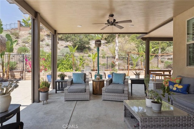 11266 Hutton Rd, Corona, CA 92883 - fenced backyard with a patio, a ceiling fan, and an outdoor living space