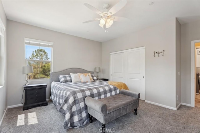 bedroom featuring a closet, carpet flooring, baseboards, and ceiling fan