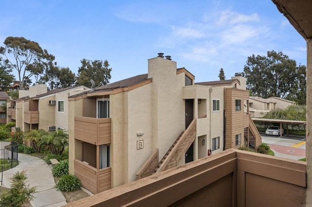 view of property featuring stairs