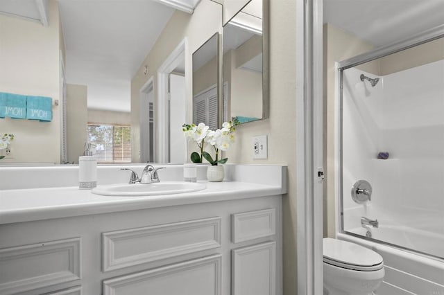 full bathroom featuring vanity, shower / bathing tub combination, and toilet