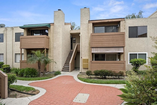 view of property with stairs