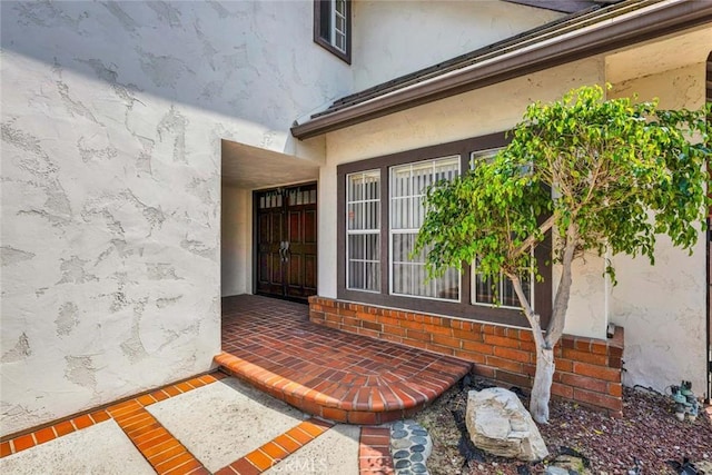 6322 E E W View Dr, Orange, CA 92869 - entrance to property featuring stucco siding and brick siding