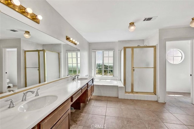 6322 E E W View Dr, Orange, CA 92869 - bathroom featuring a sink, a garden tub, a stall shower, and visible vents