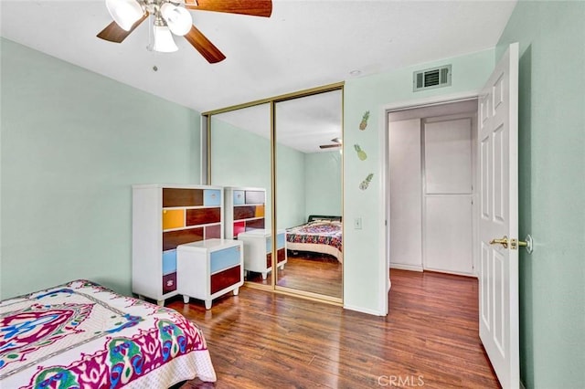 6322 E E W View Dr, Orange, CA 92869 - bedroom featuring ceiling fan, a closet, visible vents, and wood finished floors