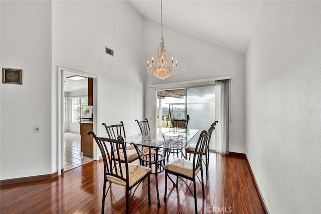 6322 E E W View Dr, Orange, CA 92869 - dining space with an inviting chandelier, wood finished floors, high vaulted ceiling, visible vents, and baseboards