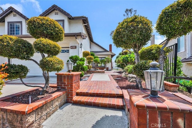 6322 E E W View Dr, Orange, CA 92869 - view of home's community featuring an attached garage