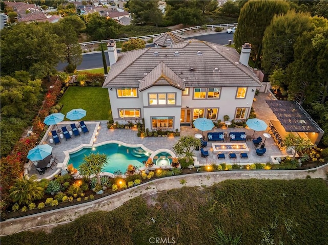 32 Panorama, Coto De Caza, CA 92679 - back of property with a patio, stucco siding, and a chimney