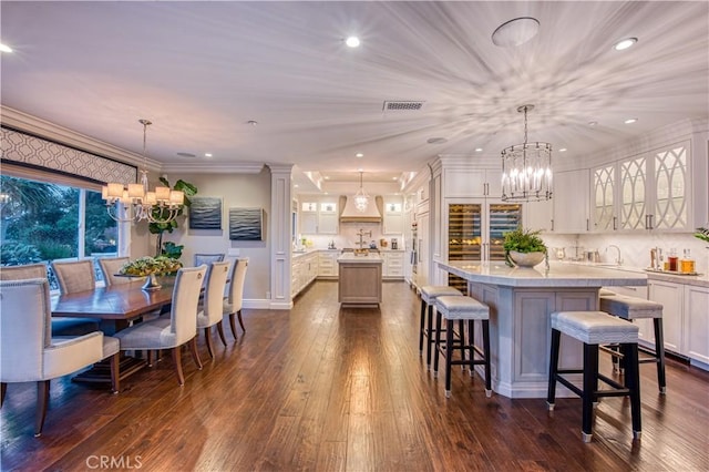 32 Panorama, Coto De Caza, CA 92679 - dining space featuring recessed lighting, an inviting chandelier, dark wood finished floors, and visible vents