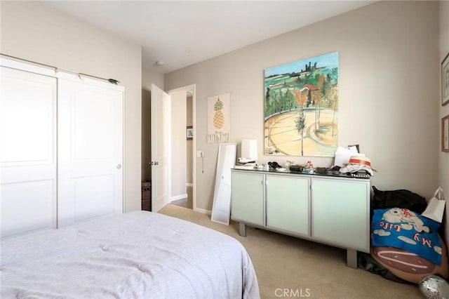 bedroom with light carpet
