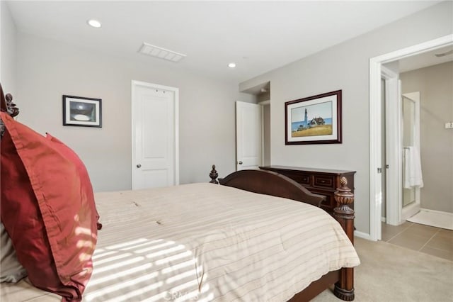 bedroom featuring light colored carpet, recessed lighting, light tile patterned floors, and baseboards