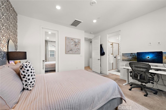 carpeted bedroom with visible vents, recessed lighting, and ensuite bathroom