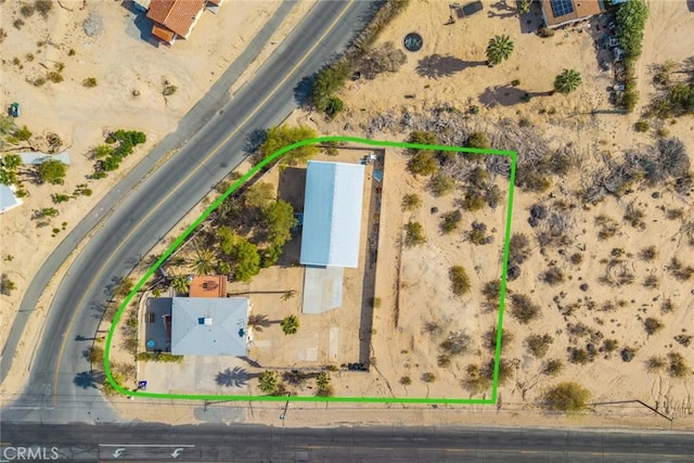 drone / aerial view with a desert view