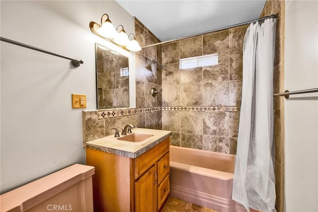 bathroom with backsplash, toilet, shower / bathtub combination with curtain, and vanity