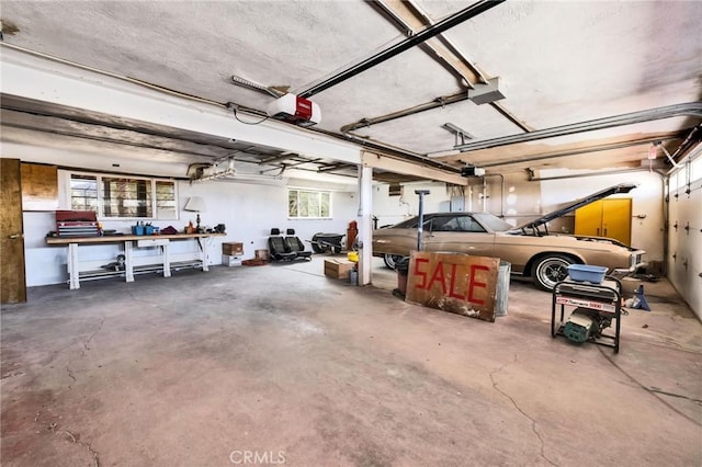 garage featuring a garage door opener