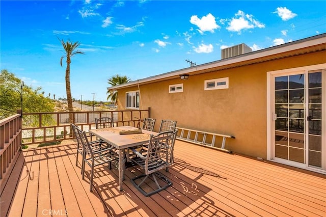deck featuring outdoor dining area