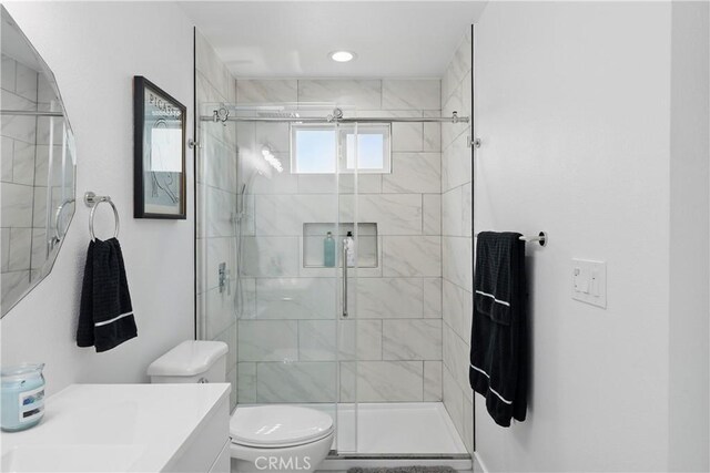 8313 Washington Ave, Whittier, CA 90602 - bathroom featuring toilet, a stall shower, and vanity