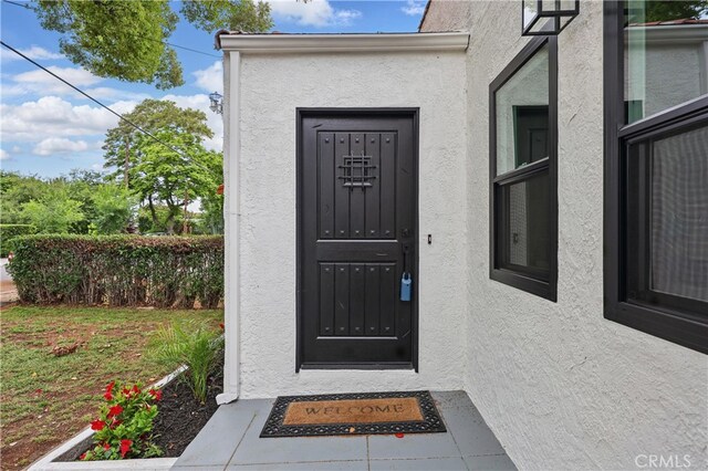 8313 Washington Ave, Whittier, CA 90602 - entrance to property featuring stucco siding