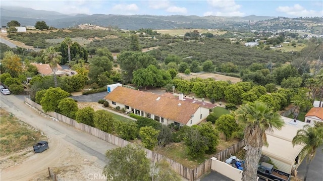 drone / aerial view featuring a mountain view