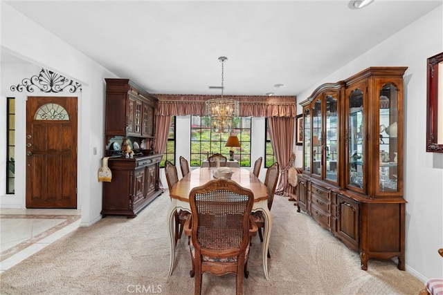 dining room featuring baseboards, recessed lighting, a notable chandelier, and light carpet